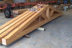 Prefabricated hand hewn trusses